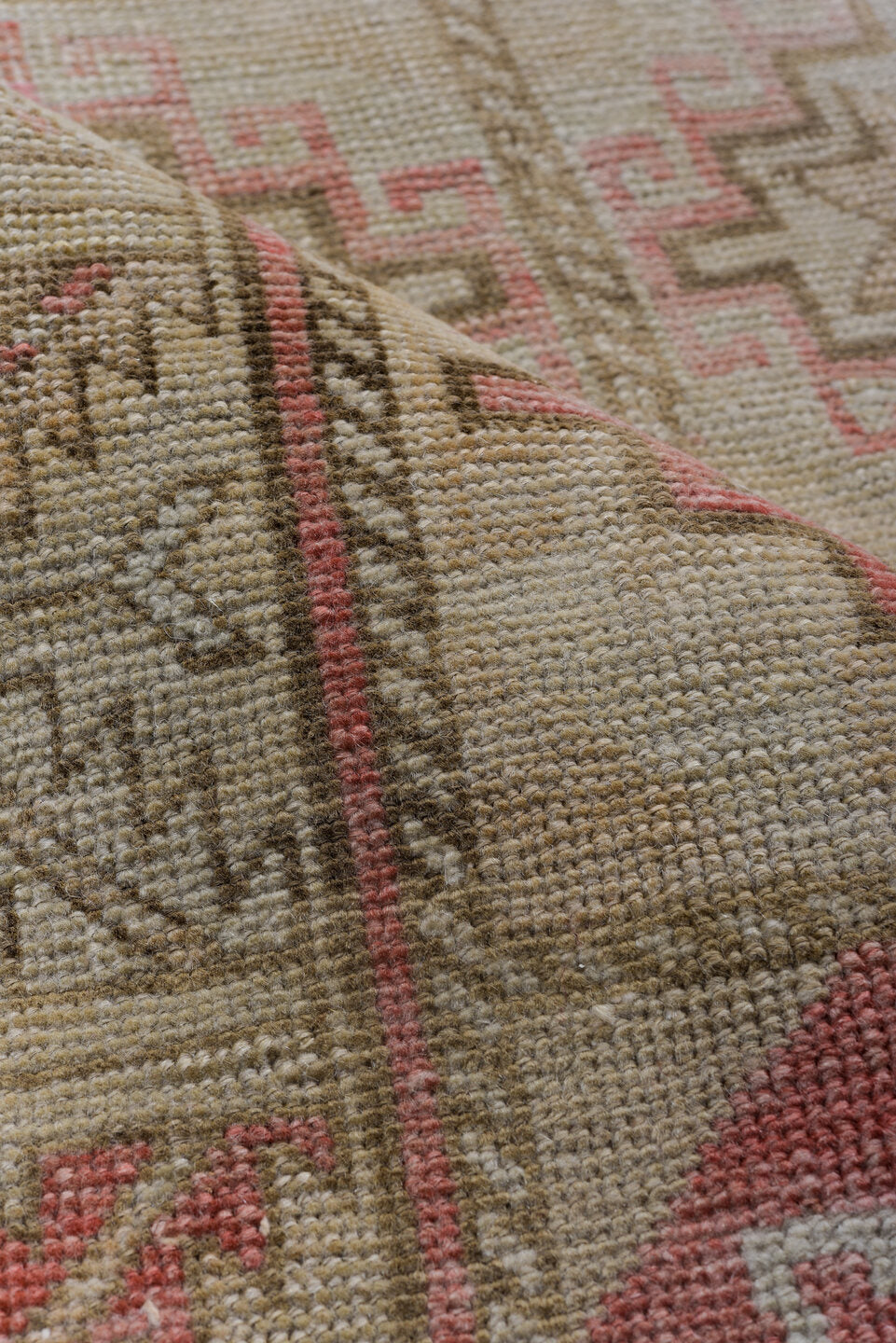 2' x 9' one-of-a-kind handmade vintage Oushak runner rug. Color palette: brown, gray, light gray, off-white, pink, red