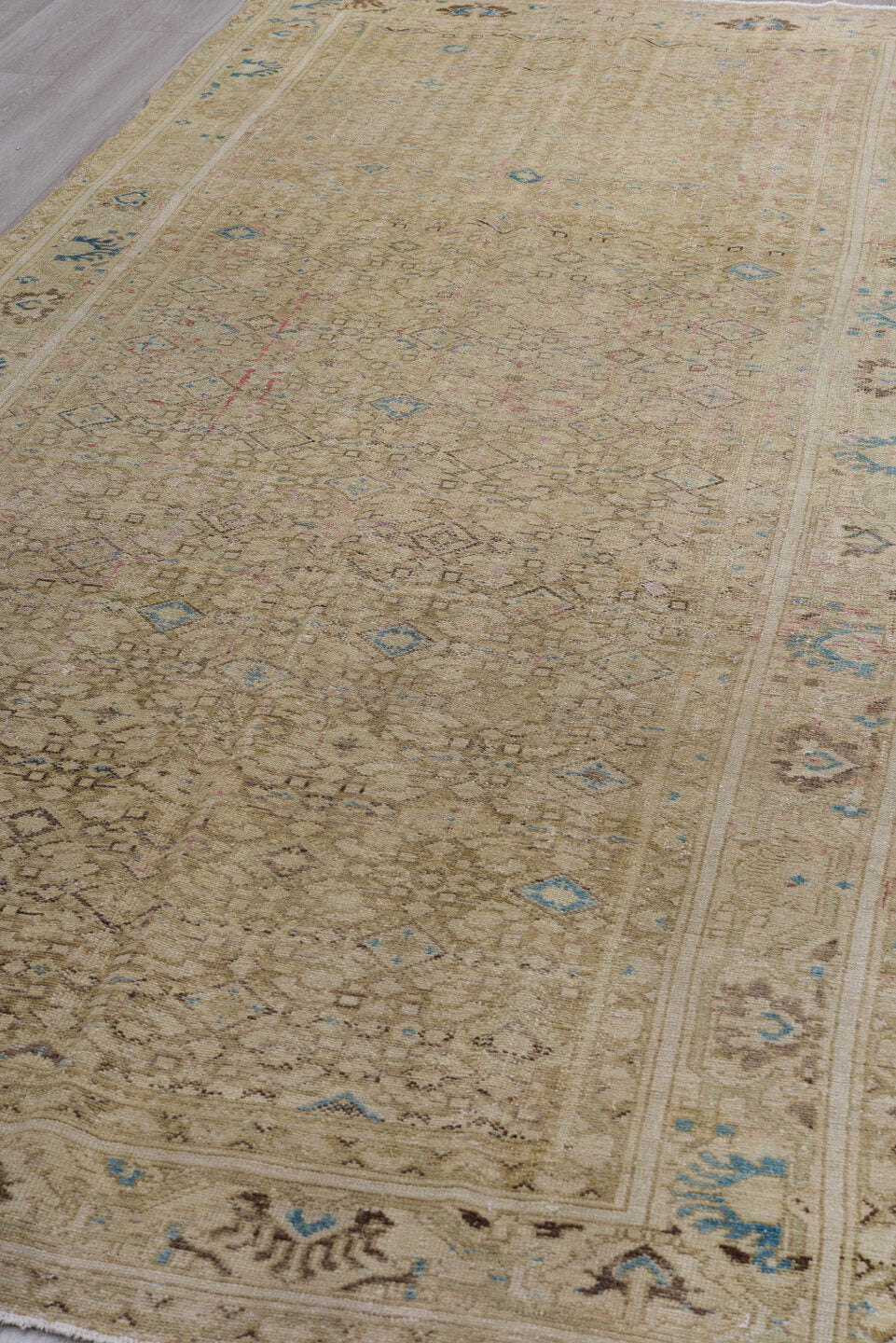 5' x 11' one-of-a-kind handmade vintage Malayer runner rug. Color palette: blue, brown, gray, light gray, off-white