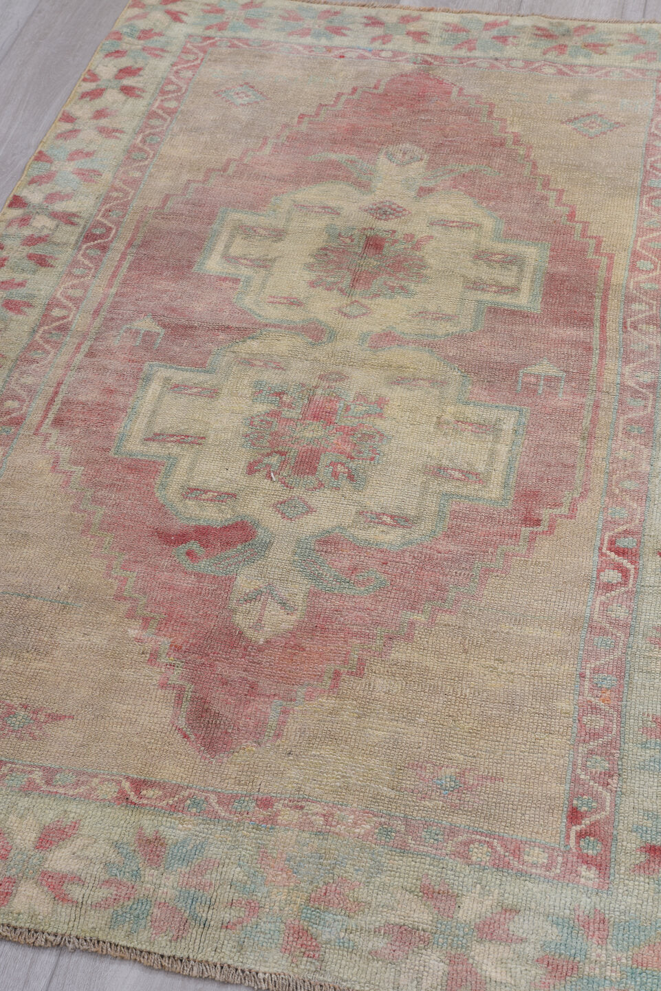 3' x 5' one-of-a-kind handmade antique Oushak small size rug. Color palette: ivory, blush, pale aqua, rose, taupe, coral