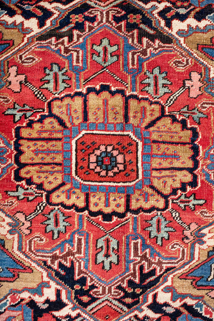 11' x 14' one-of-a-kind handmade vintage Heriz oversize rug. Color palette: red, navy, ivory, sky blue, coral, camel, pink