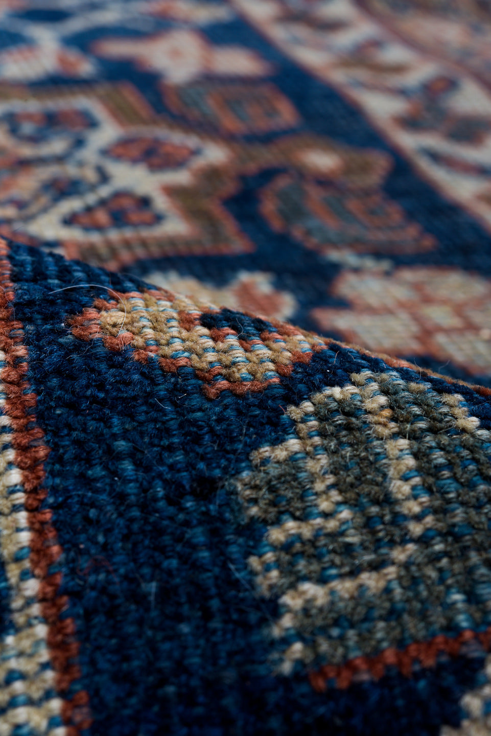 12' x 18' one-of-a-kind handmade antique Sultanabad oversize rug. Color palette: terra cotta, navy, ivory, slate, rust