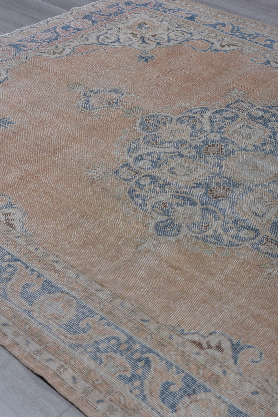 7' x 10' one-of-a-kind handmade antique Sparta large size rug. Color palette: apricot, dusty blue, ivory, rose, taupe, beige