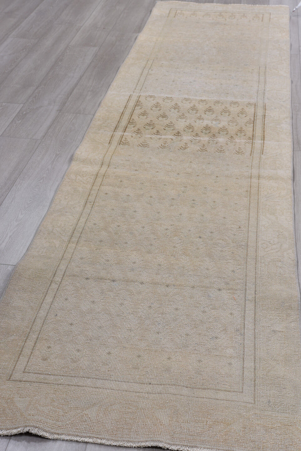 3' x 12' one-of-a-kind handmade antique Sparta runner rug. Color palette: ivory, beige, taupe, camel, pale blue, sand, gray