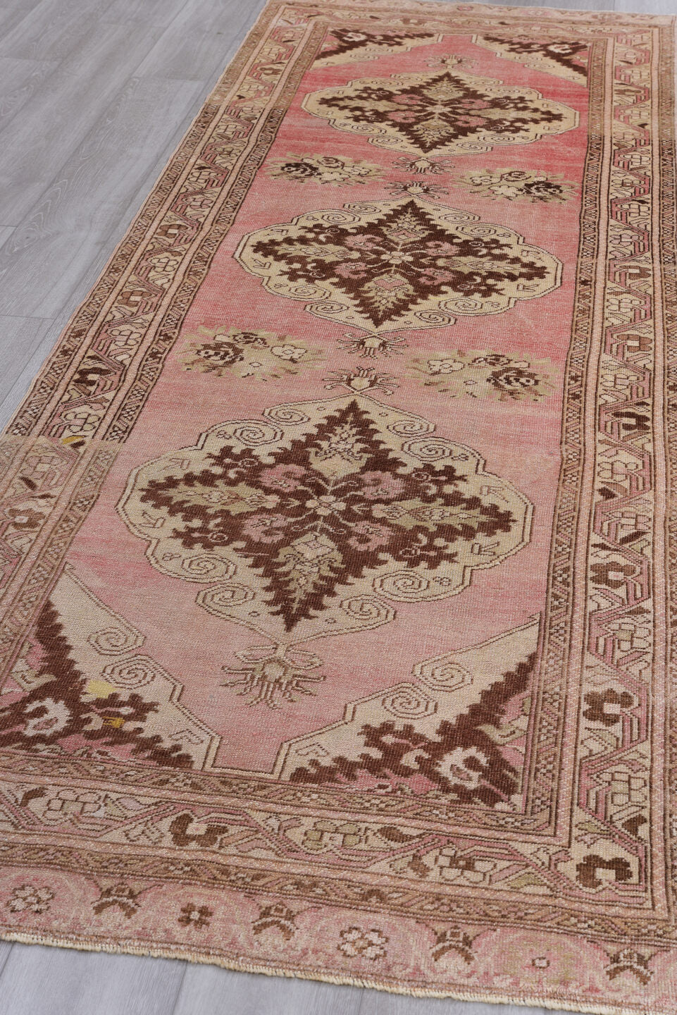 3' x 10' one-of-a-kind handmade vintage Oushak runner rug. Color palette: brown, gray, light gray, off-white, orange, pink