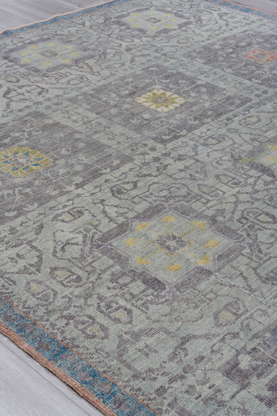 8' x 12' one-of-a-kind handmade vintage Oushak large size rug. Color palette: gray, pale blue, ivory, gold, taupe, rust