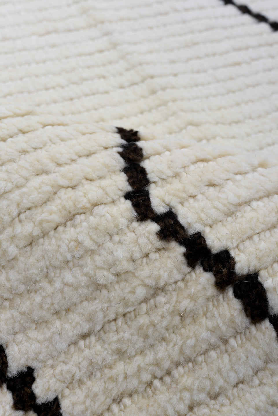 9' x 13' one-of-a-kind handmade vintage Tulu large size rug. Color palette: black, brown, gray, light gray, linen, off-white