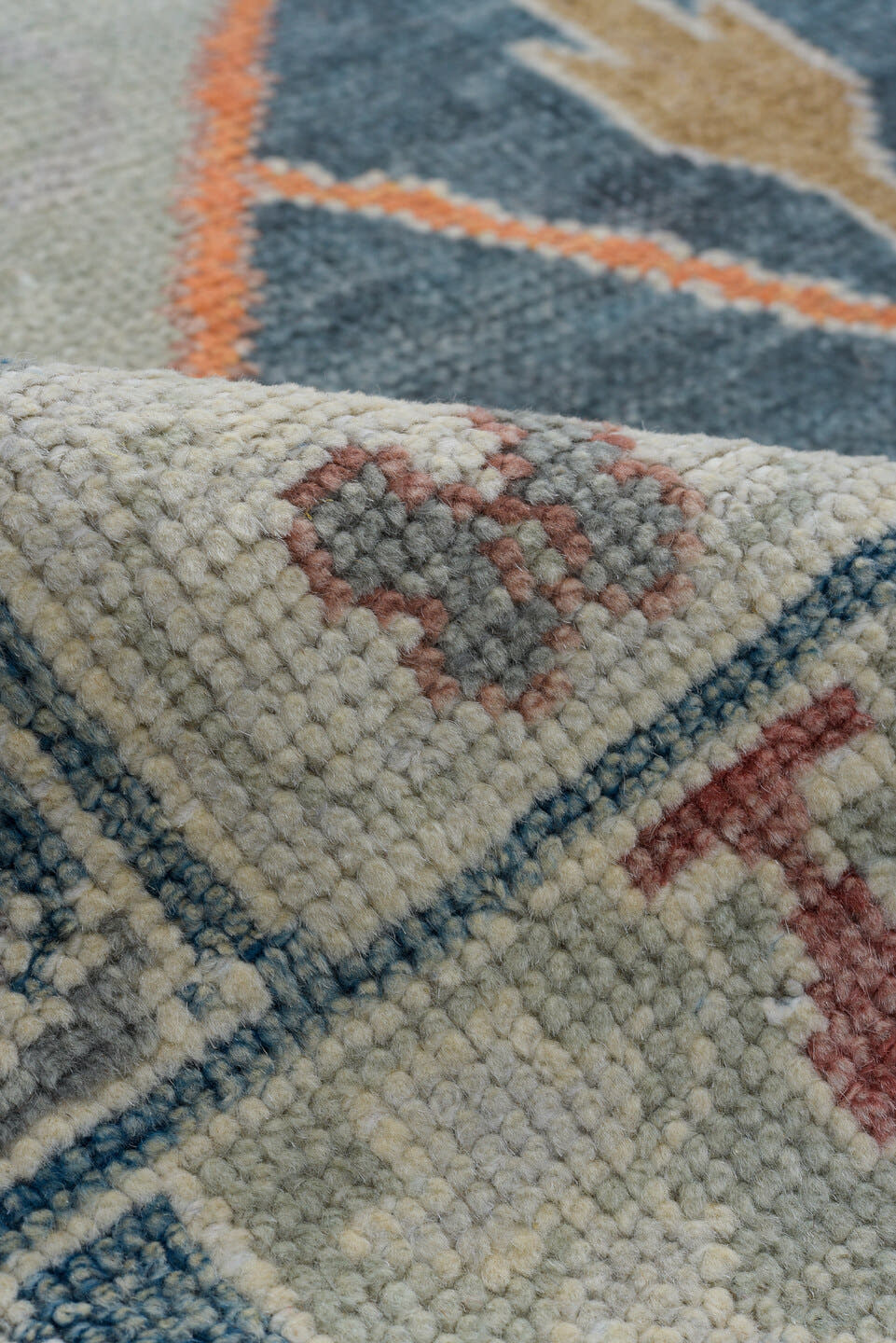 11' x 15' one-of-a-kind handmade vintage Oushak oversize rug. Color palette: blue, ivory, slate, gold, taupe, terra cotta