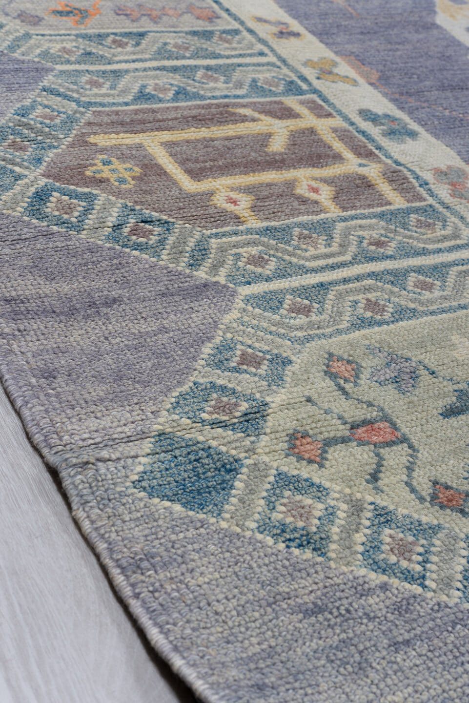 11' x 15' one-of-a-kind handmade vintage Oushak oversize rug. Color palette: blue, ivory, slate, gold, taupe, terra cotta