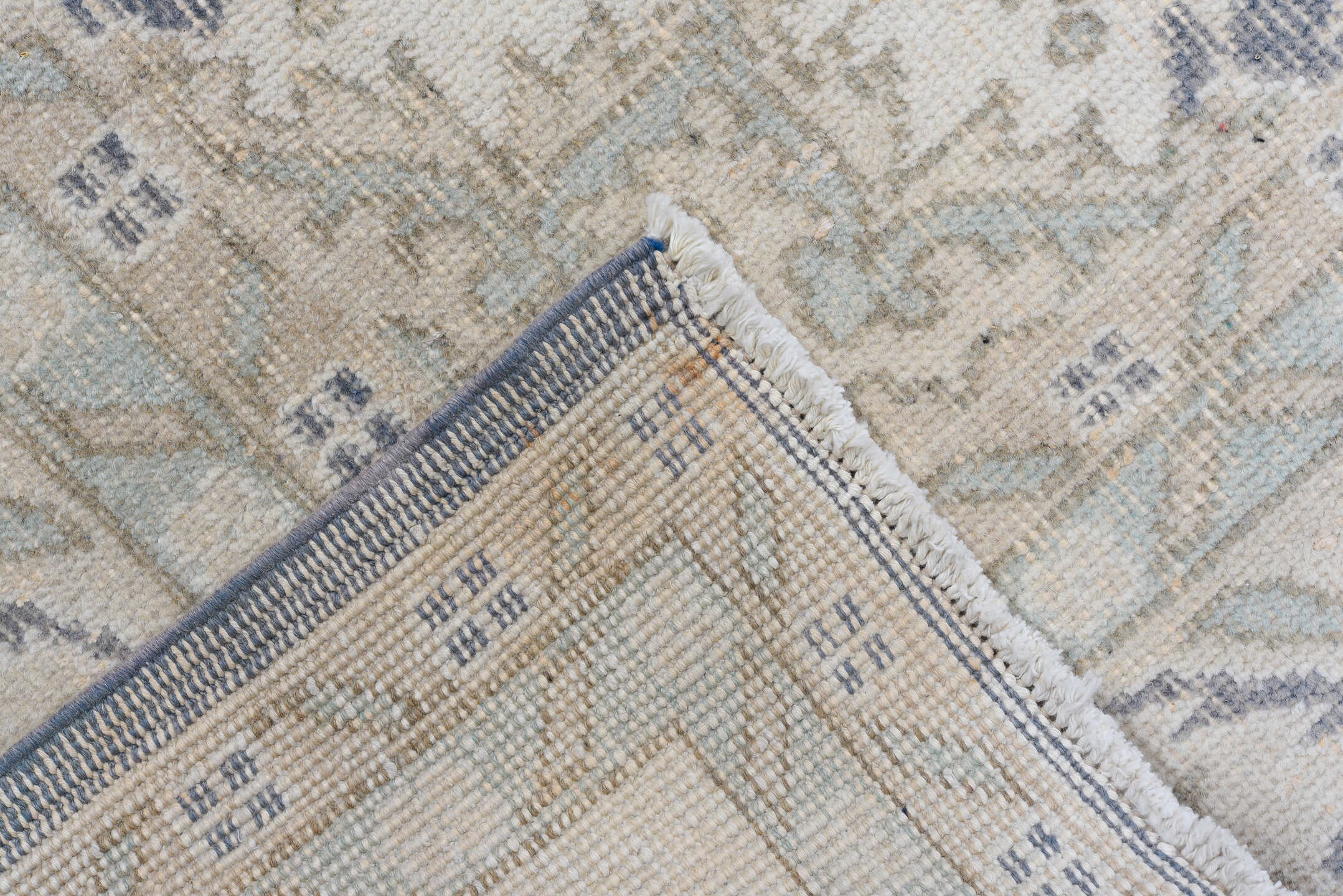 7' x 11' one-of-a-kind handmade antique Sparta large size rug. Color palette: ivory, slate, taupe, sage, beige, pale blue