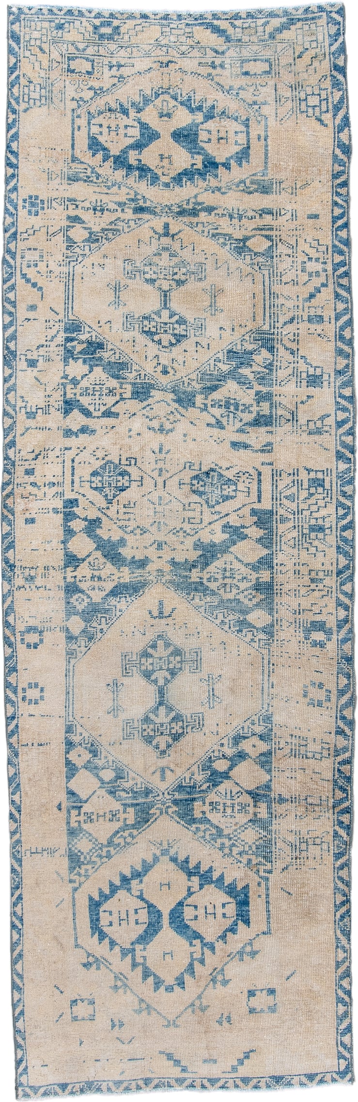 3' x 9' one-of-a-kind handmade antique Heriz runner rug. Color palette: ivory, sky blue, beige, camel, light blue