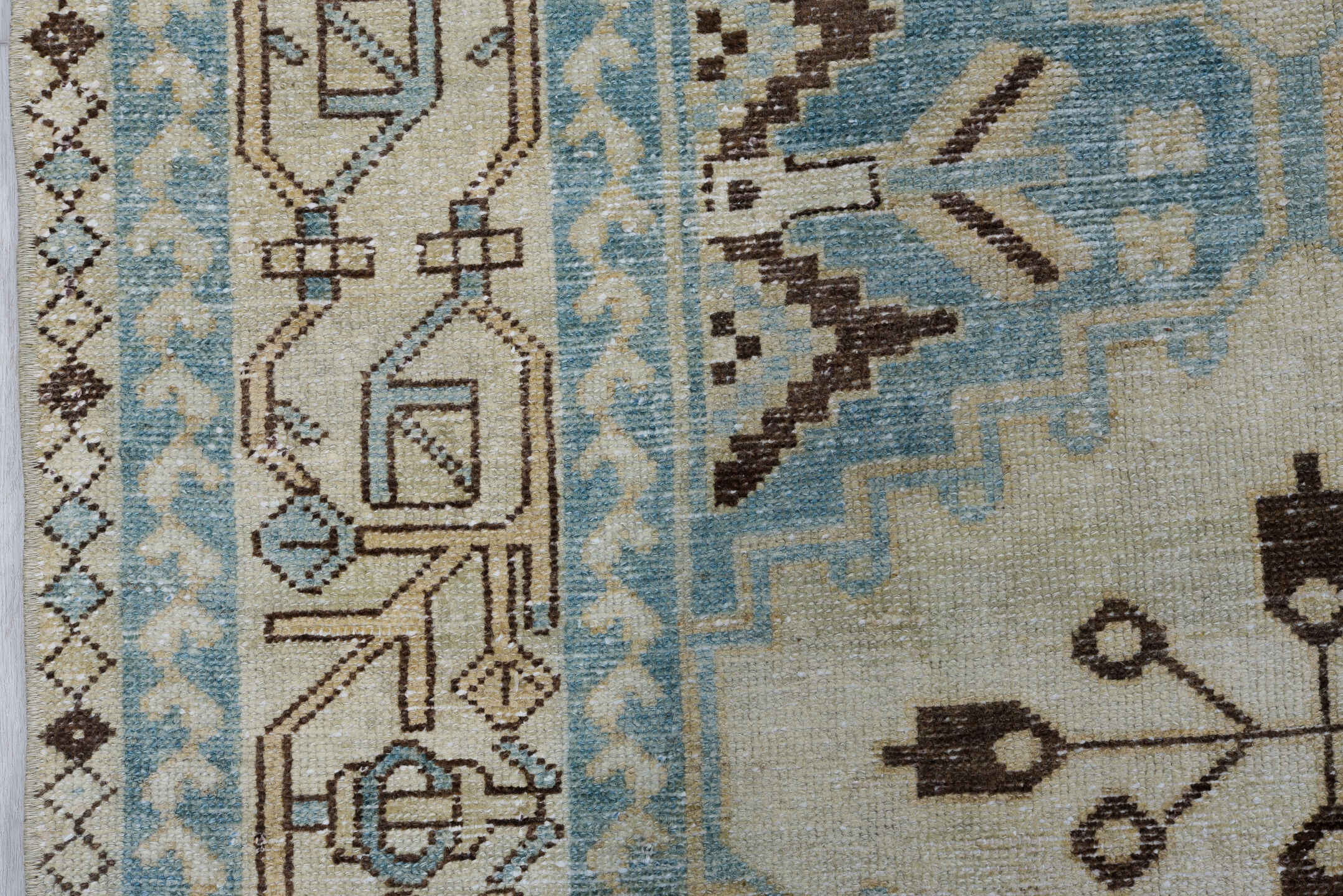 5' x 6' one-of-a-kind handmade antique Baktiary rug. Color palette: ivory, sky blue, camel, brown, taupe, light blue, beige