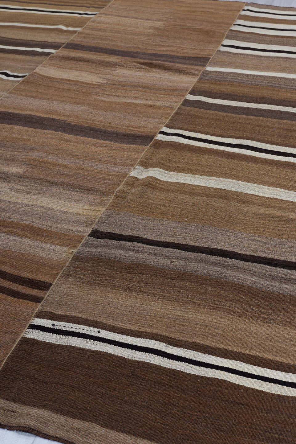 8' x 11' one-of-a-kind handmade vintage Kilim large size rug. Color palette: camel, taupe, brown, ivory, dark_brown, beige