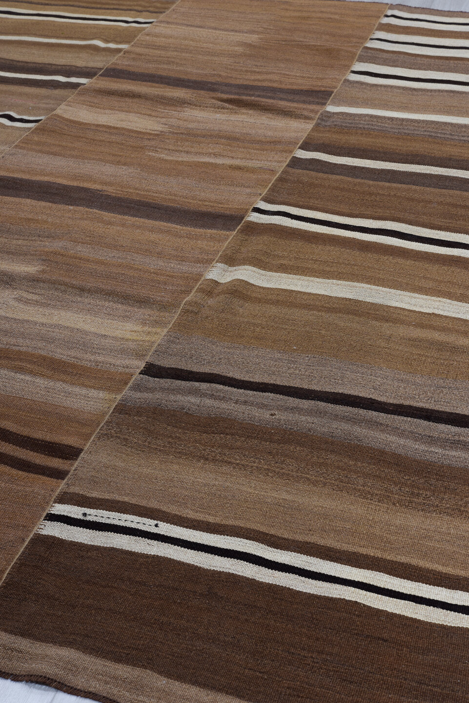 8' x 11' one-of-a-kind handmade vintage Kilim large size rug. Color palette: camel, taupe, brown, ivory, dark_brown, beige