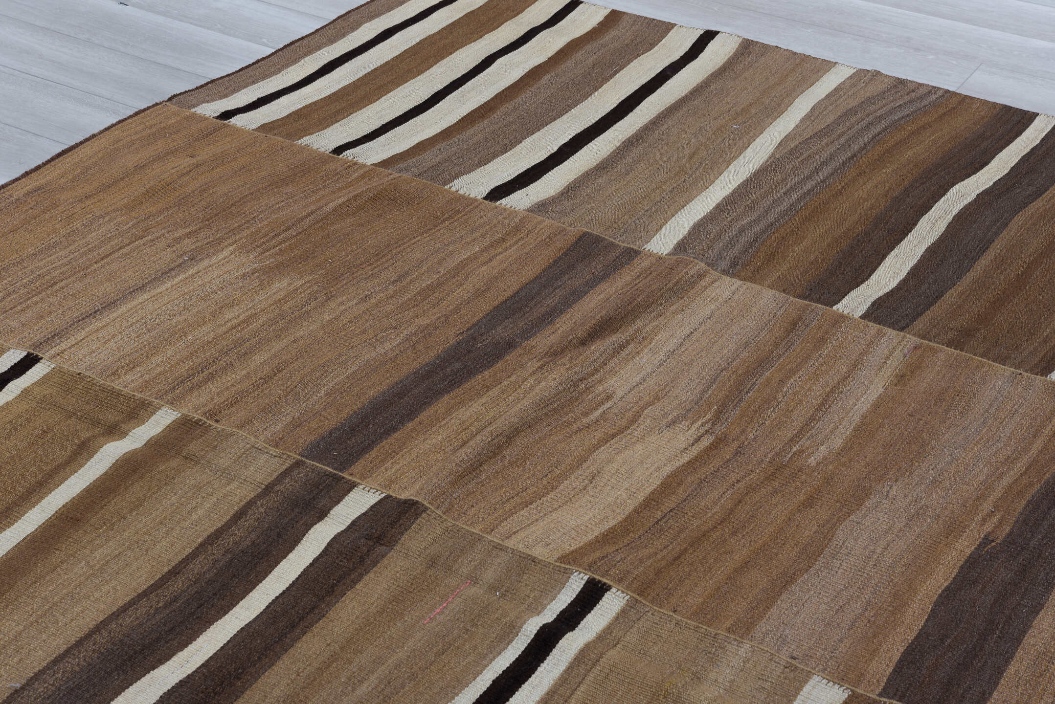 8' x 11' one-of-a-kind handmade vintage Kilim large size rug. Color palette: camel, taupe, brown, ivory, dark_brown, beige