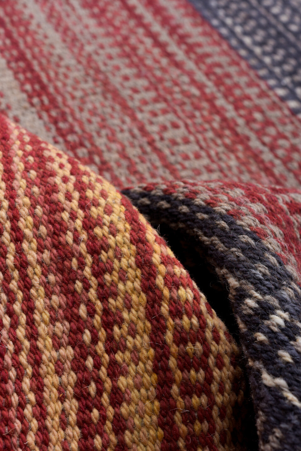 13' x 17' one-of-a-kind handmade vintage Kilim oversize rug. Color palette: red, charcoal, ivory, camel, rose, gray, black