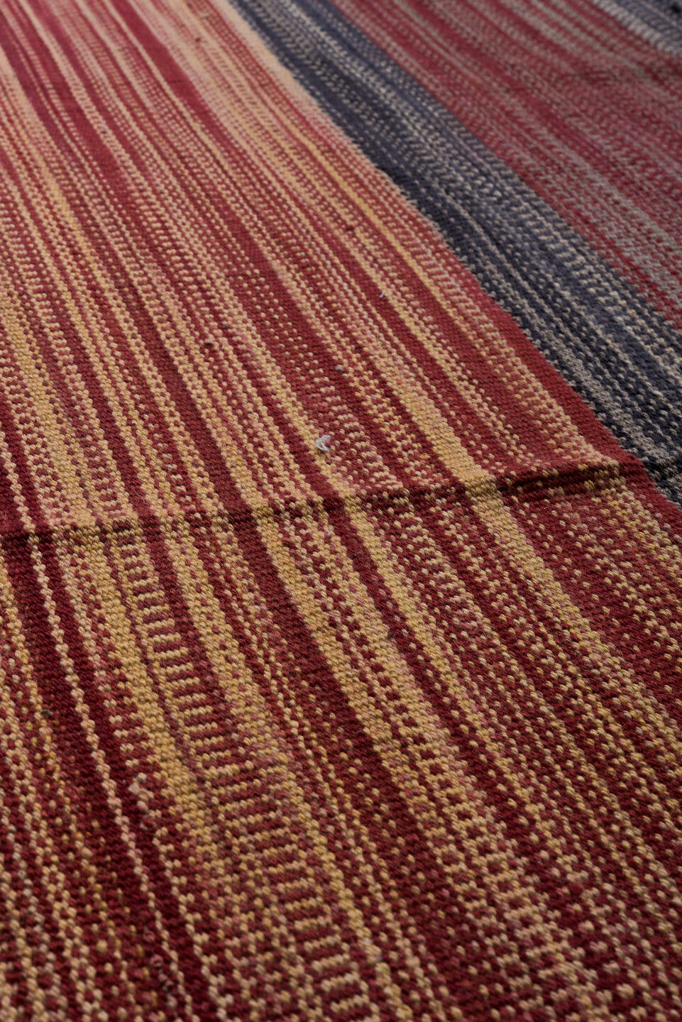 13' x 17' one-of-a-kind handmade vintage Kilim oversize rug. Color palette: red, charcoal, ivory, camel, rose, gray, black