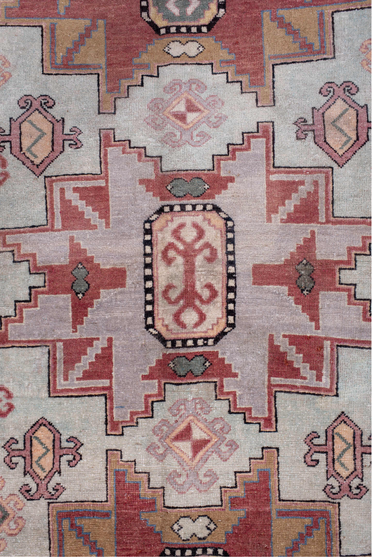 4' x 7' one-of-a-kind handmade antique Khotan rug. Color palette: ivory, camel, rose, dusty blue, sage, rust, taupe, beige