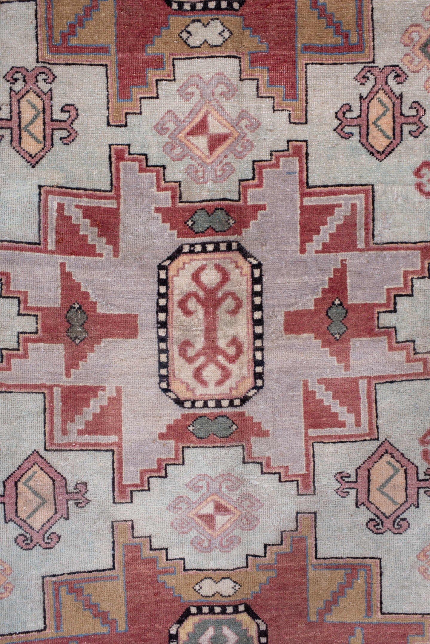 4' x 7' one-of-a-kind handmade antique Khotan rug. Color palette: ivory, camel, rose, dusty blue, sage, rust, taupe, beige