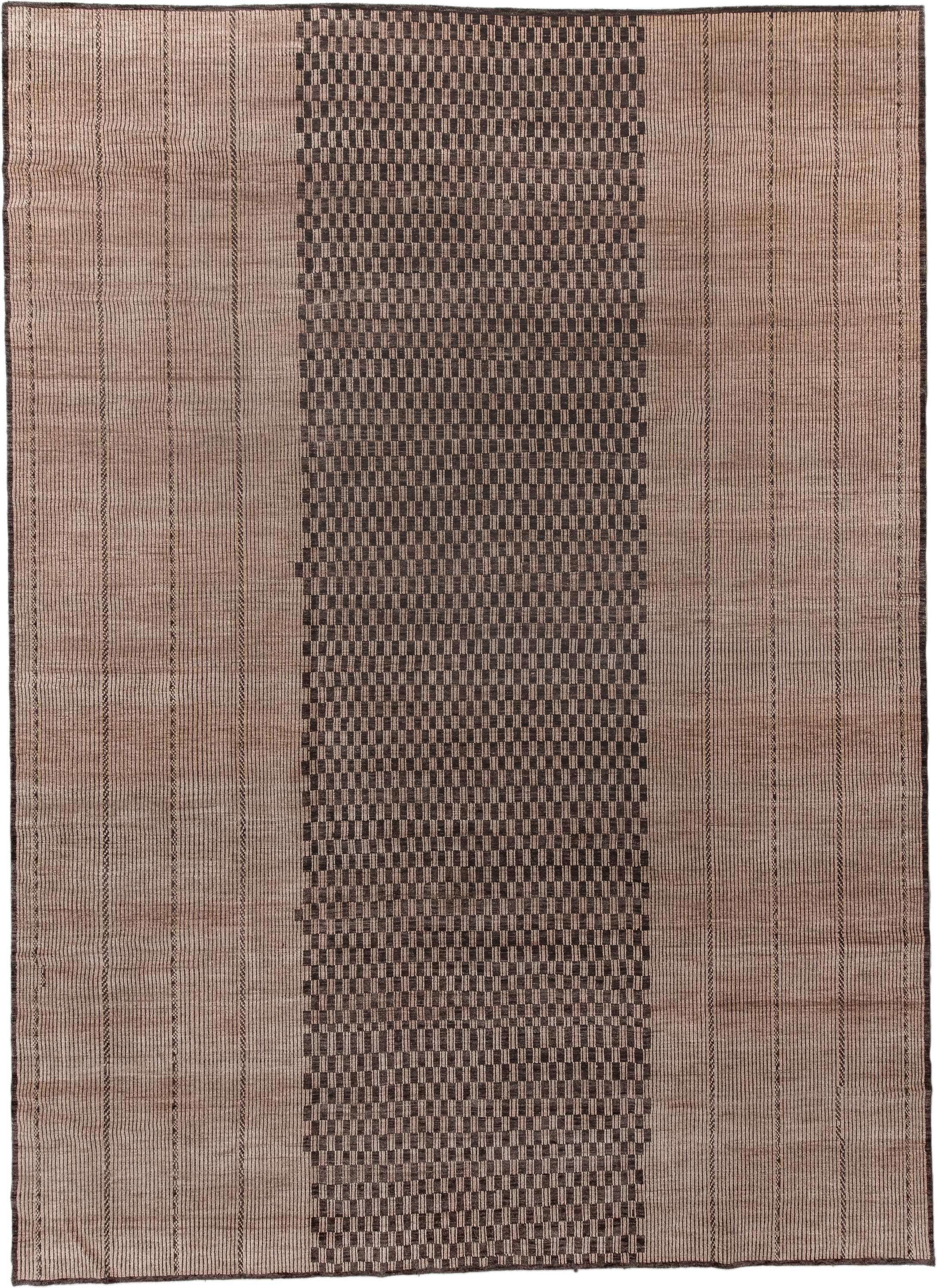 13' x 18' one-of-a-kind handmade vintage Tuareg oversize rug. Color palette: camel, brown, taupe, charcoal, beige, gray