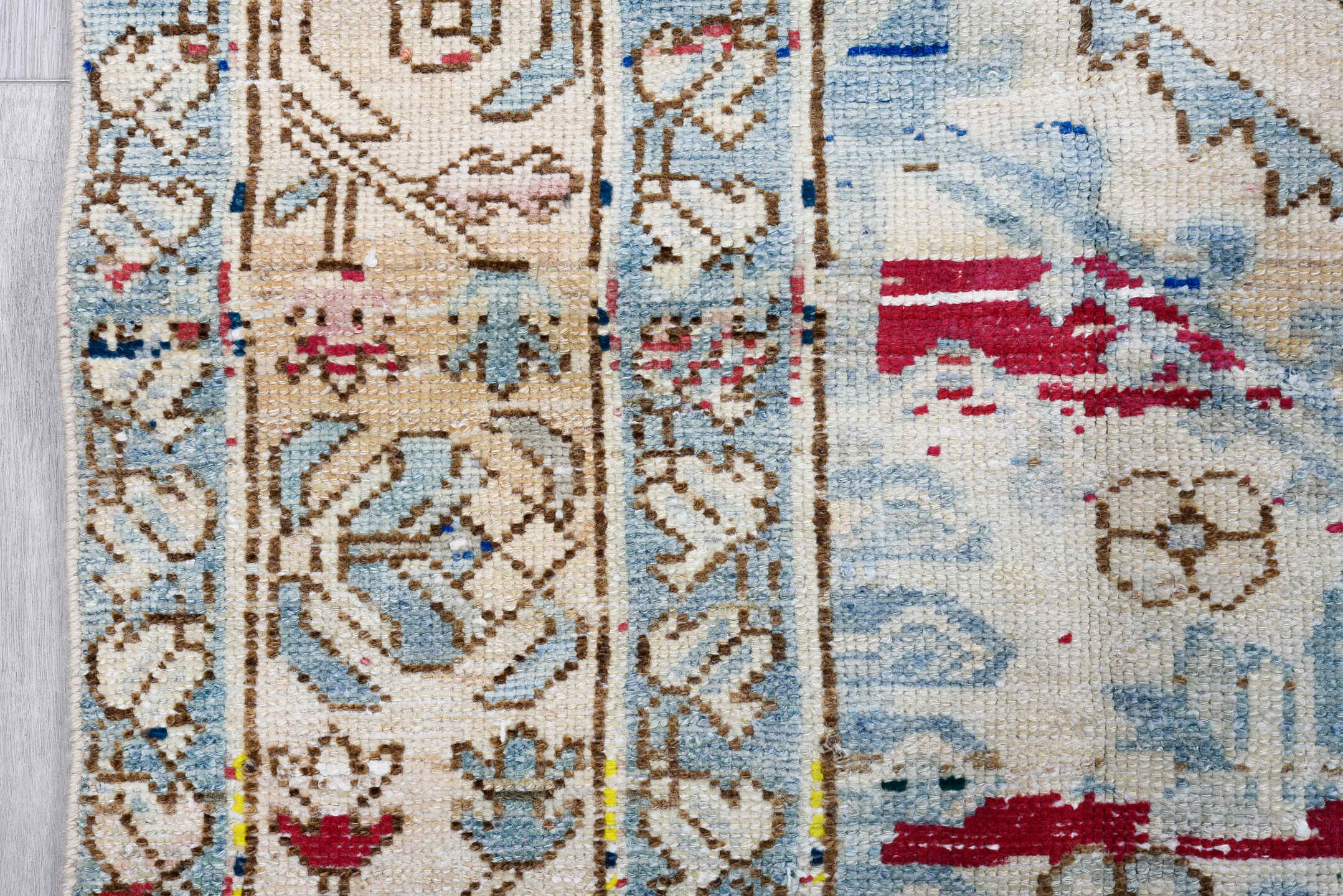 5' x 9' one-of-a-kind handmade antique Baktiary medium size rug. Color palette: ivory, sky blue, camel, brown, rose, crimson