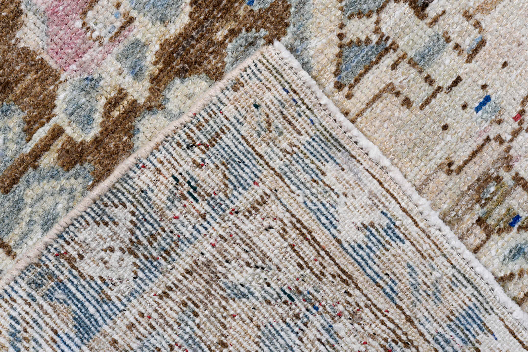 5' x 9' one-of-a-kind handmade antique Baktiary medium size rug. Color palette: ivory, sky blue, camel, brown, rose, crimson