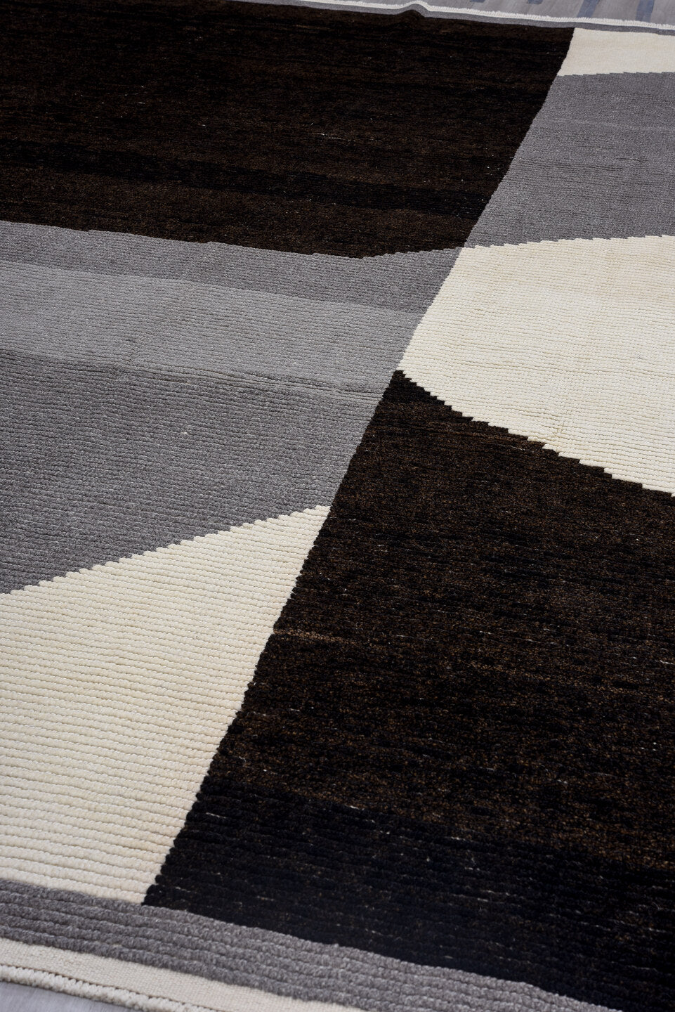 10' x 14' one-of-a-kind handmade vintage Tulu large size rug. Color palette: charcoal, black, ivory, gray