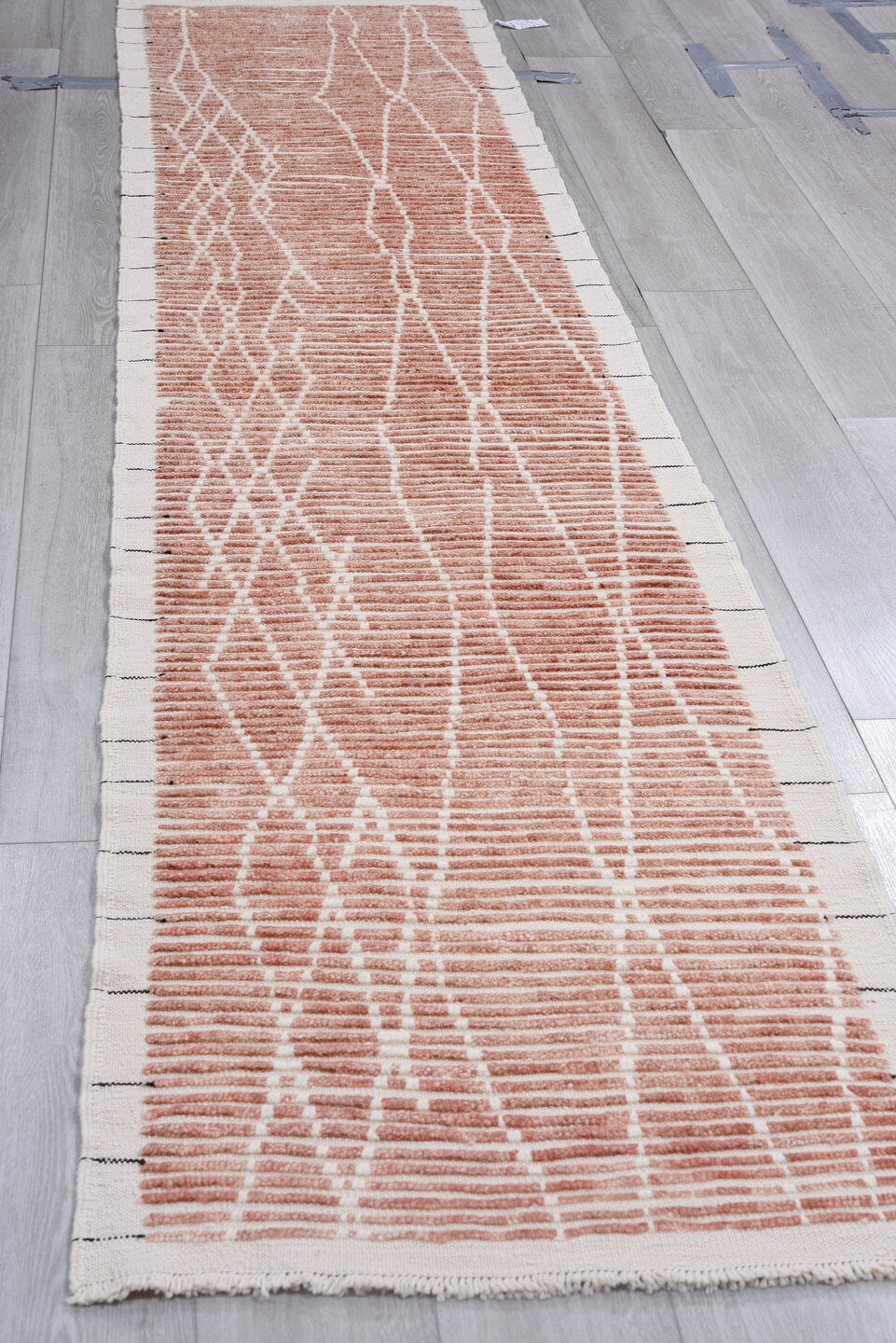 2' x 12' one-of-a-kind handmade vintage Tulu runner rug. Color palette: brown, gray, light gray, off-white, pink, red