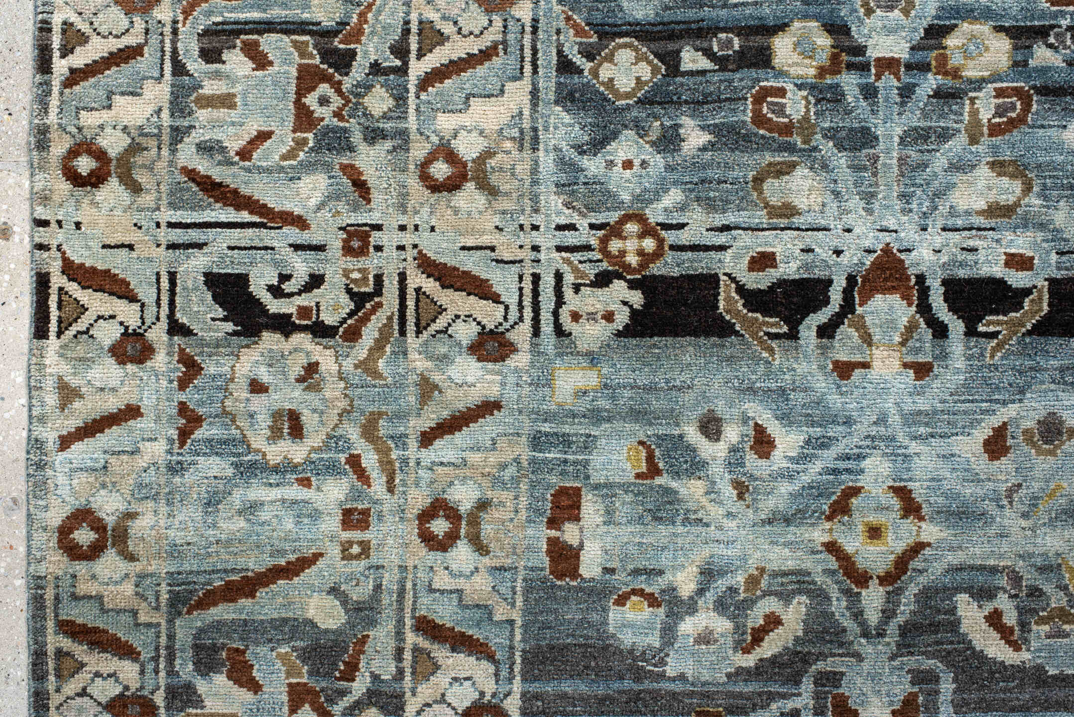 6' x 9' one-of-a-kind handmade vintage Lilian medium size rug. Color palette: black, blue, brown, charcoal, dark gray