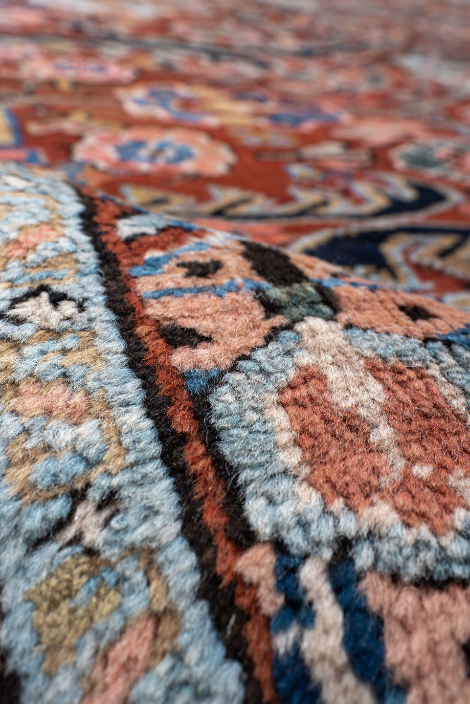 9' x 12' one-of-a-kind handmade antique Heriz large size rug. Color palette: rust, navy, ivory, sky_blue, camel, slate