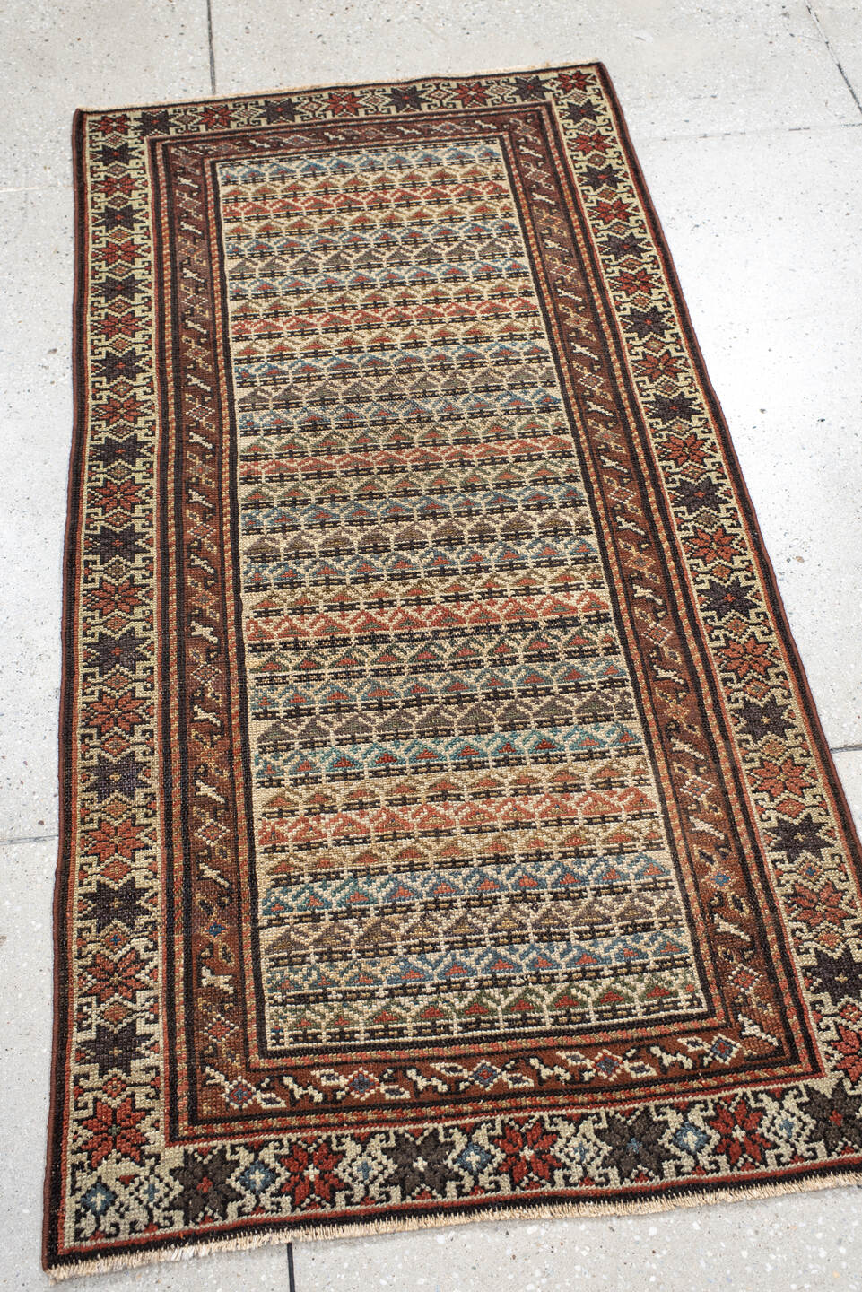 2' x 5' one-of-a-kind handmade vintage Malayer small size rug. Color palette: black, brown, dim gray, gray, pink