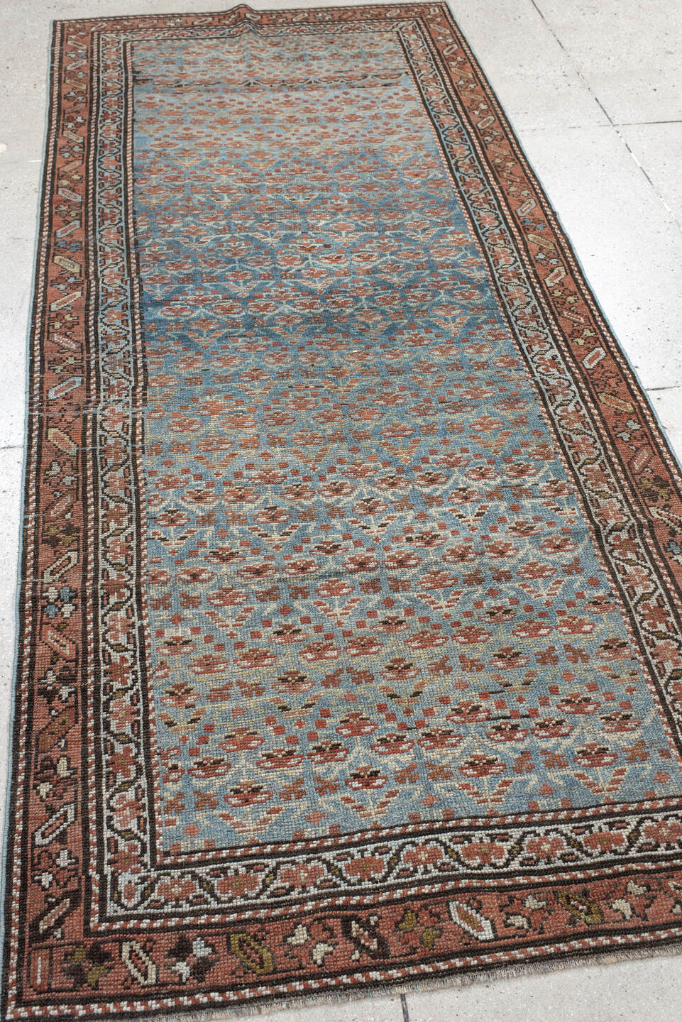 3' x 9' one-of-a-kind handmade antique NW Persian runner rug. Color palette: sky blue, rust, ivory, brown, slate, camel