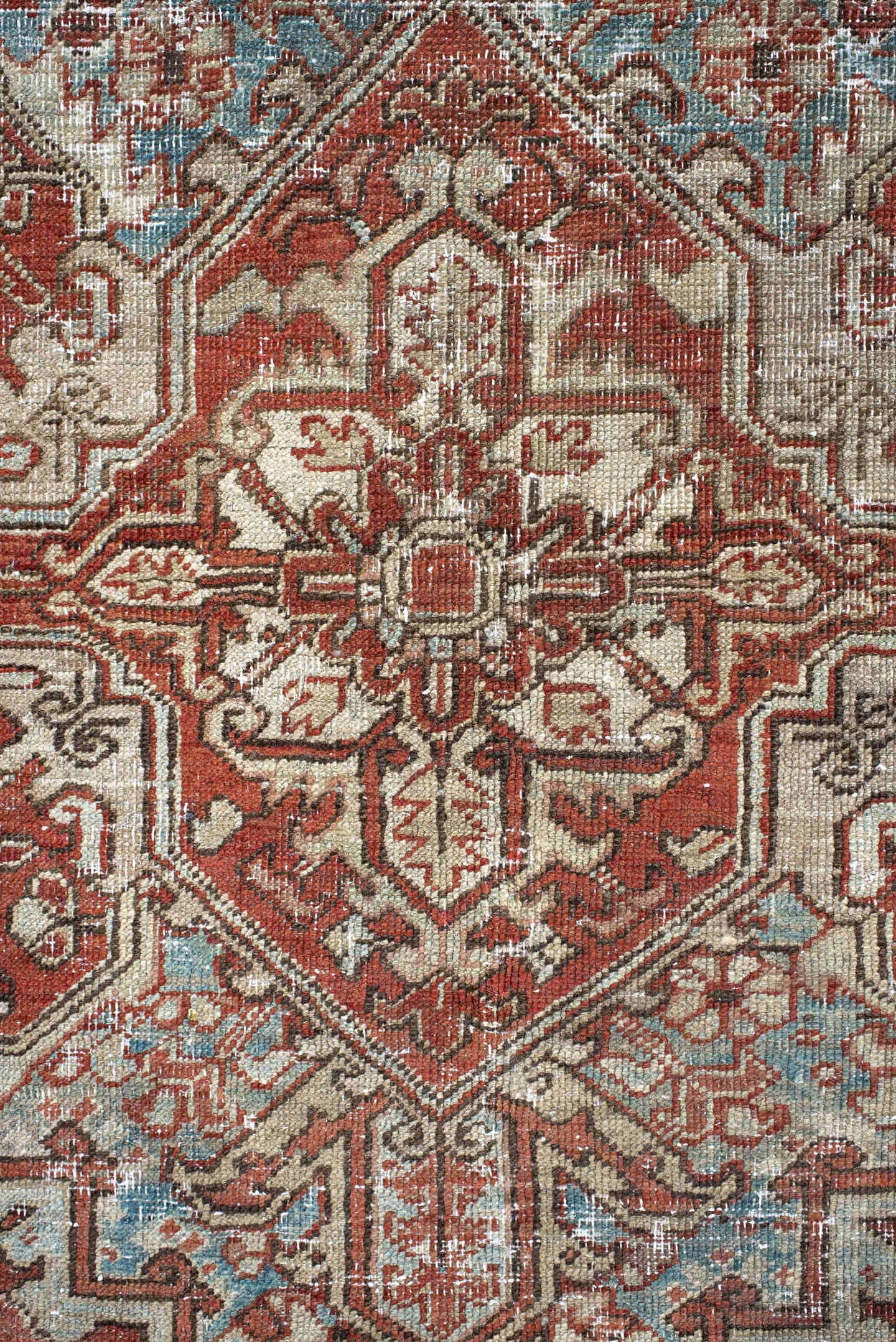 7' x 11' one-of-a-kind handmade antique Heriz large size rug. Color palette: ivory, rust, sky_blue, terra_cotta, taupe