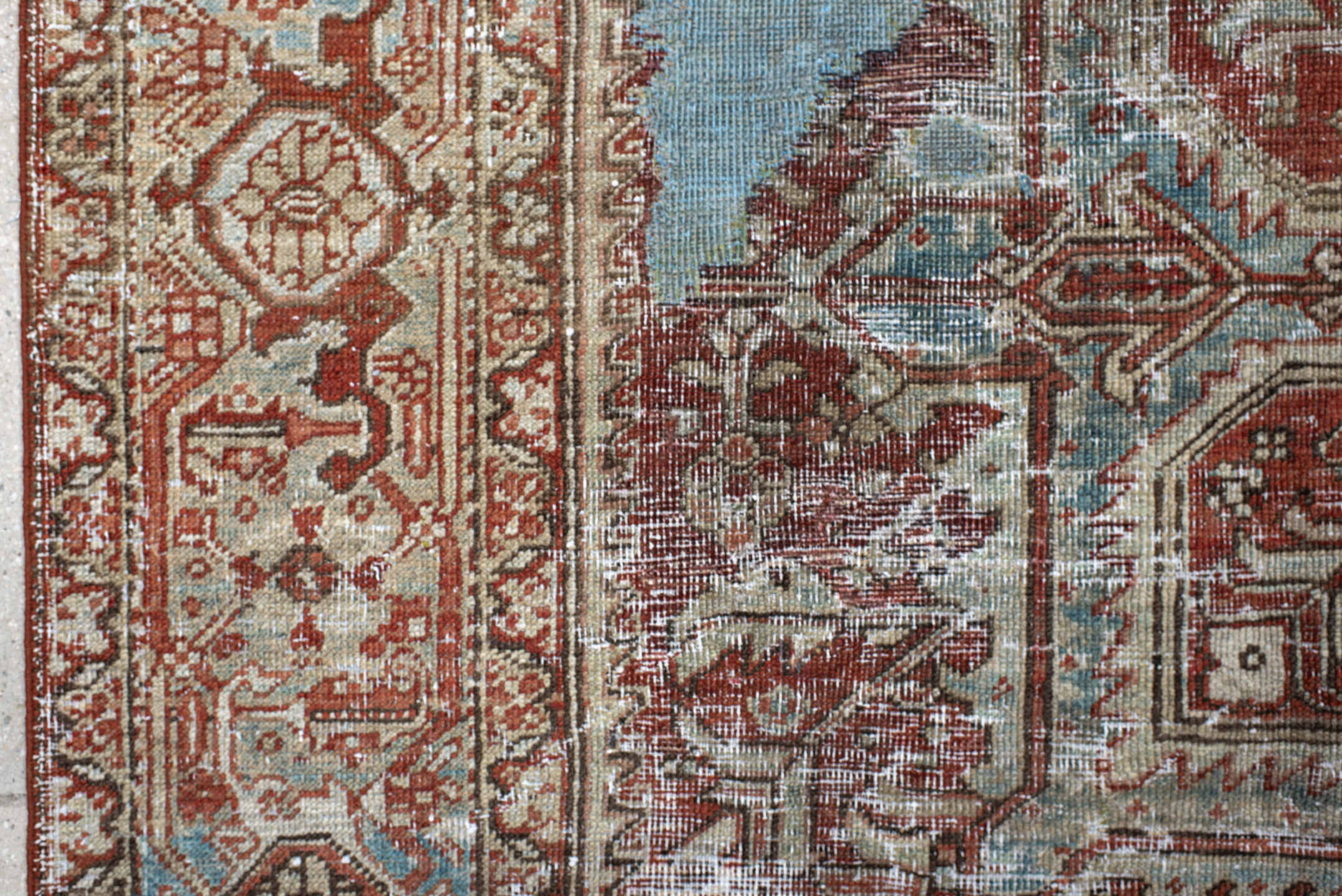 7' x 11' one-of-a-kind handmade antique Heriz large size rug. Color palette: ivory, rust, sky_blue, terra_cotta, taupe
