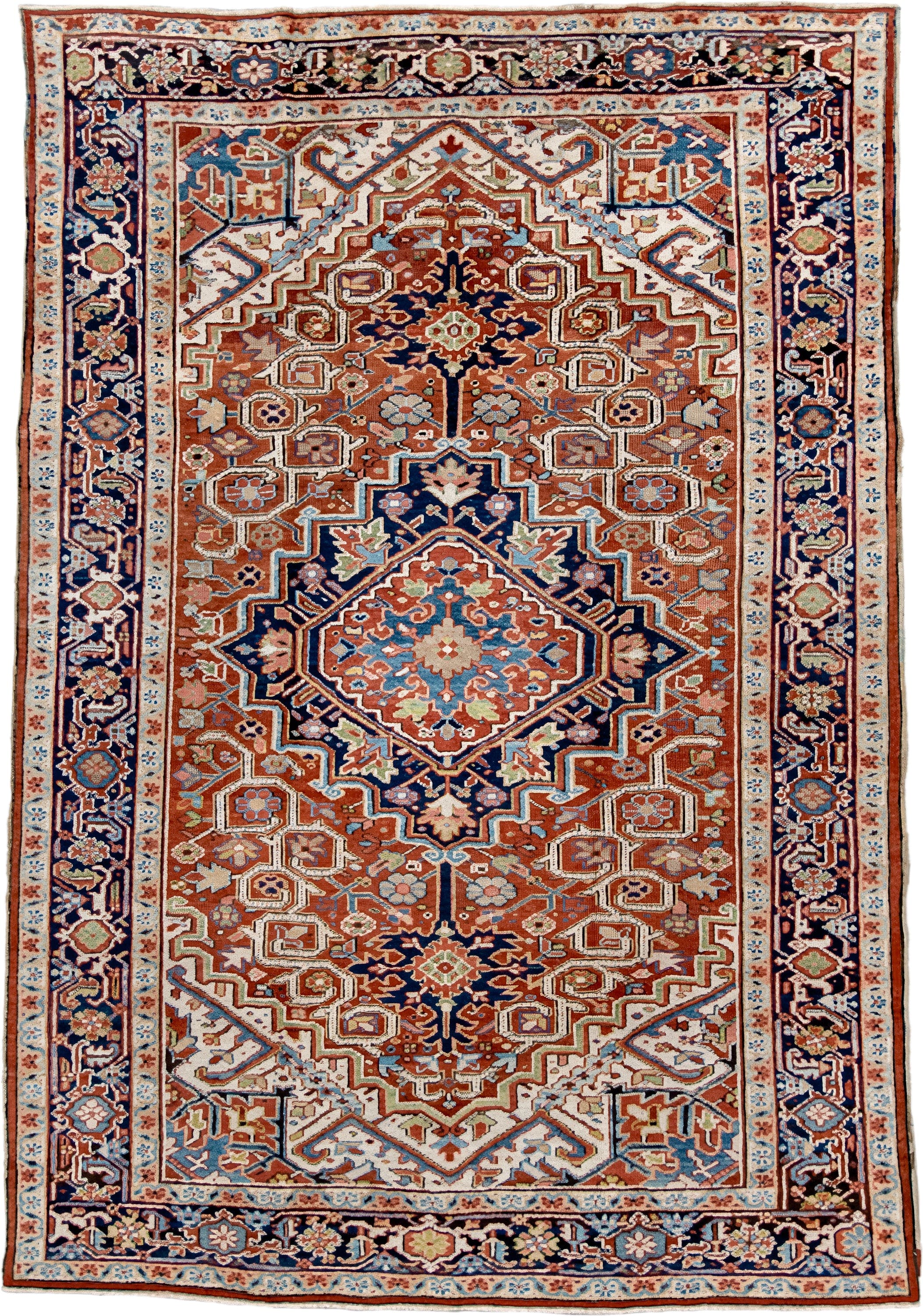 7' x 11' one-of-a-kind handmade antique Heriz large size rug. Color palette: rust, navy, ivory, sky blue, terra cotta, camel