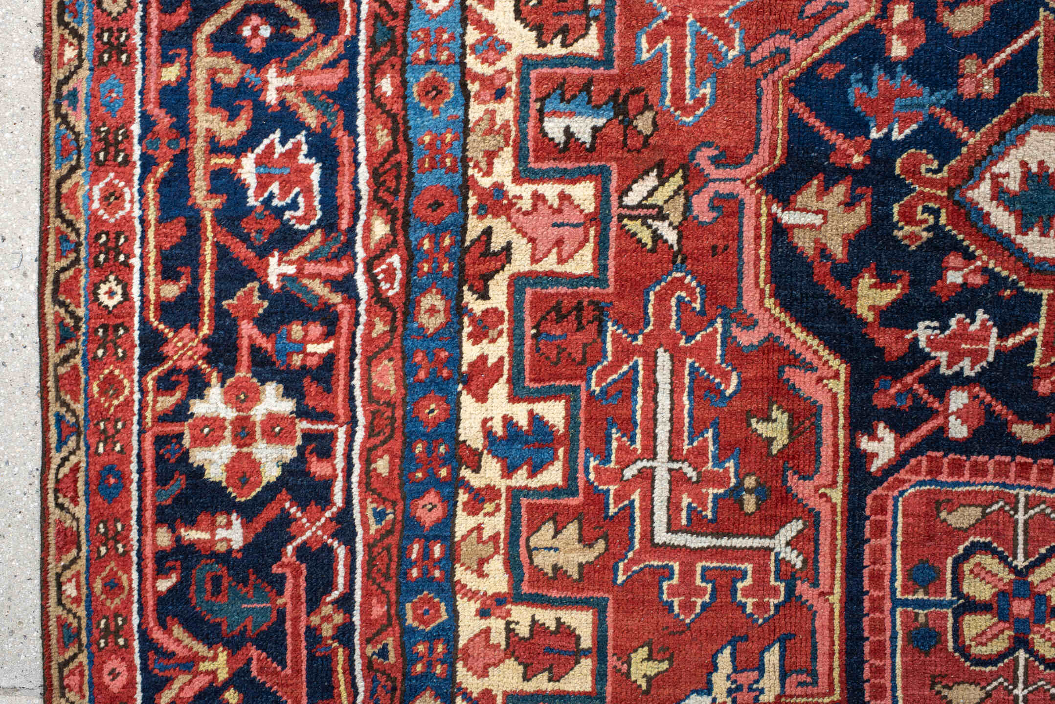 8' x 11' one-of-a-kind handmade antique Heriz large size rug. Color palette: rust, navy, ivory, sky blue, terra cotta, camel