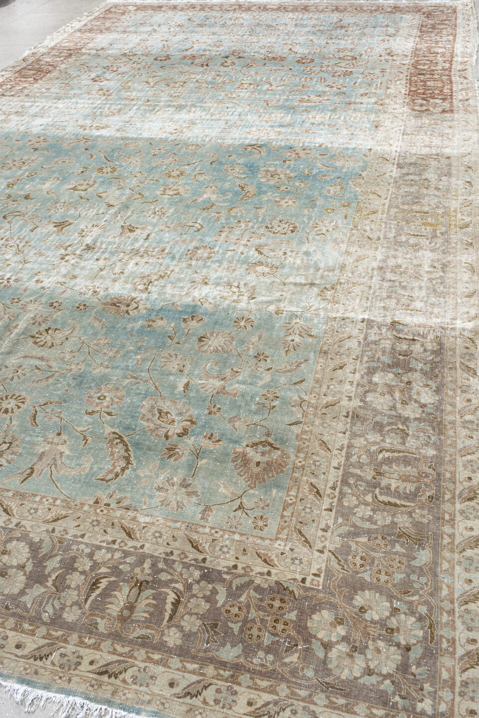 10' x 18' one-of-a-kind handmade antique Kashan rug. Color palette: ivory, pale blue, taupe, rust, beige, camel, light blue
