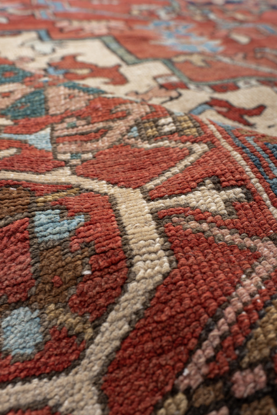 9' x 12' one-of-a-kind handmade vintage Serapi large size rug. Color palette: terra cotta, ivory, sky blue, navy, rust