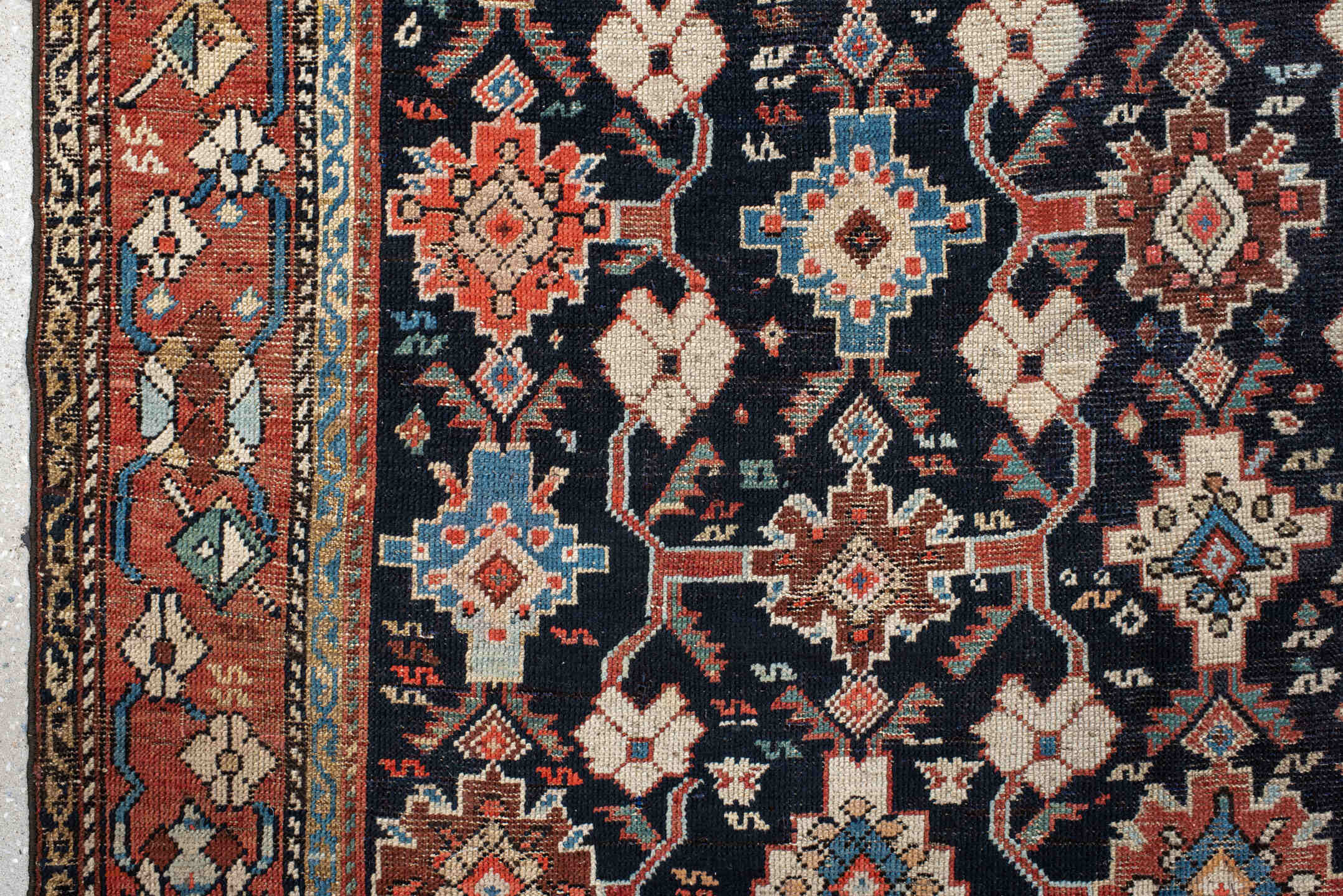 4' x 9' one-of-a-kind handmade vintage Karabagh runner rug. Color palette: arapawa, black, blue, brown, charcoal, dark gray