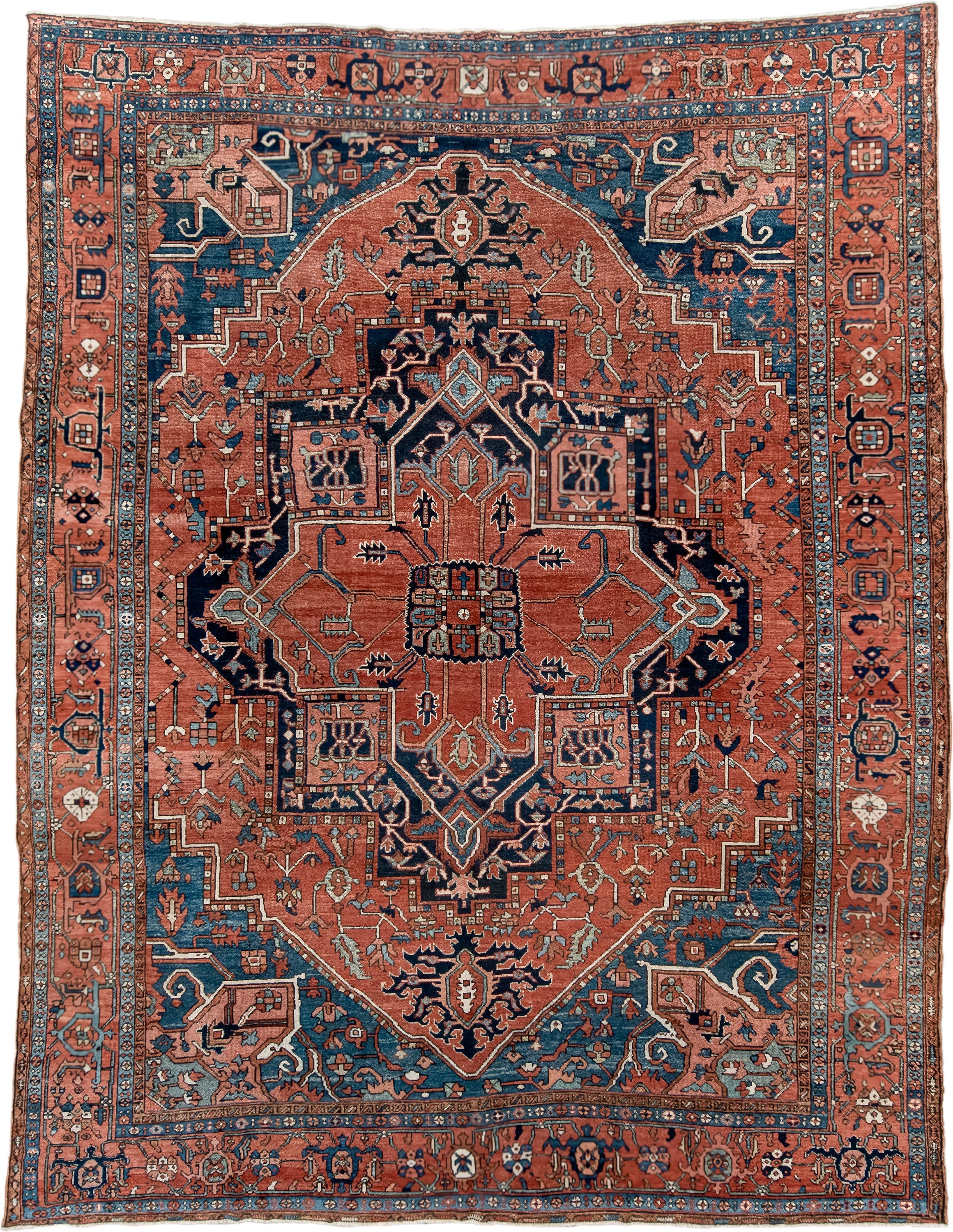10' x 13' one-of-a-kind handmade antique Serapi large size rug. Color palette: terra cotta, navy, ivory, rust, sky blue