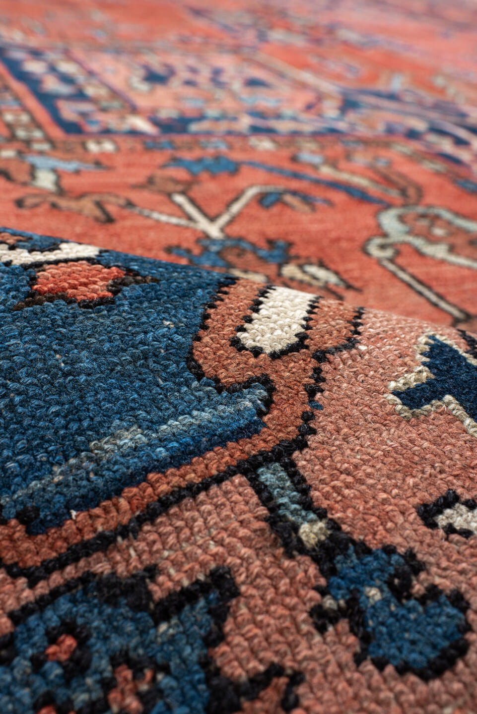 10' x 13' one-of-a-kind handmade antique Serapi large size rug. Color palette: terra cotta, navy, ivory, rust, sky blue