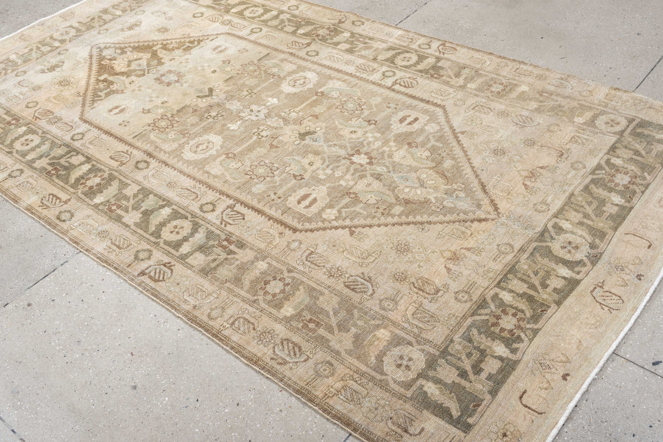 5' x 8' one-of-a-kind handmade vintage Bidjar medium size rug. Color palette: ivory, taupe, sage, camel, brown, rose, olive
