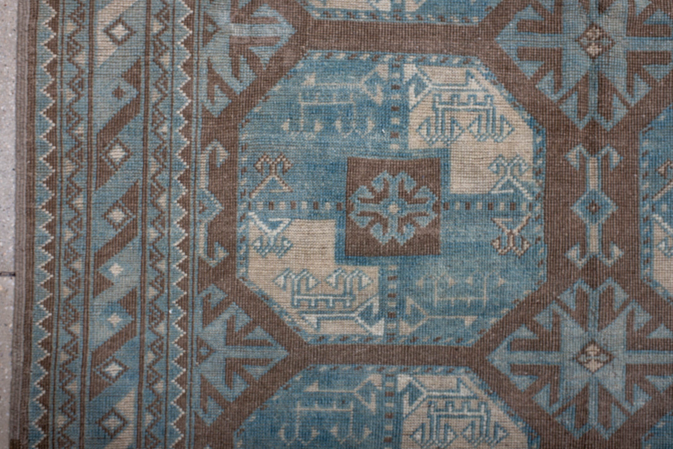 4' x 7' one-of-a-kind handmade vintage Afghan rug. Color palette: black, blue, brown, charcoal, dark gray, dim gray, gray