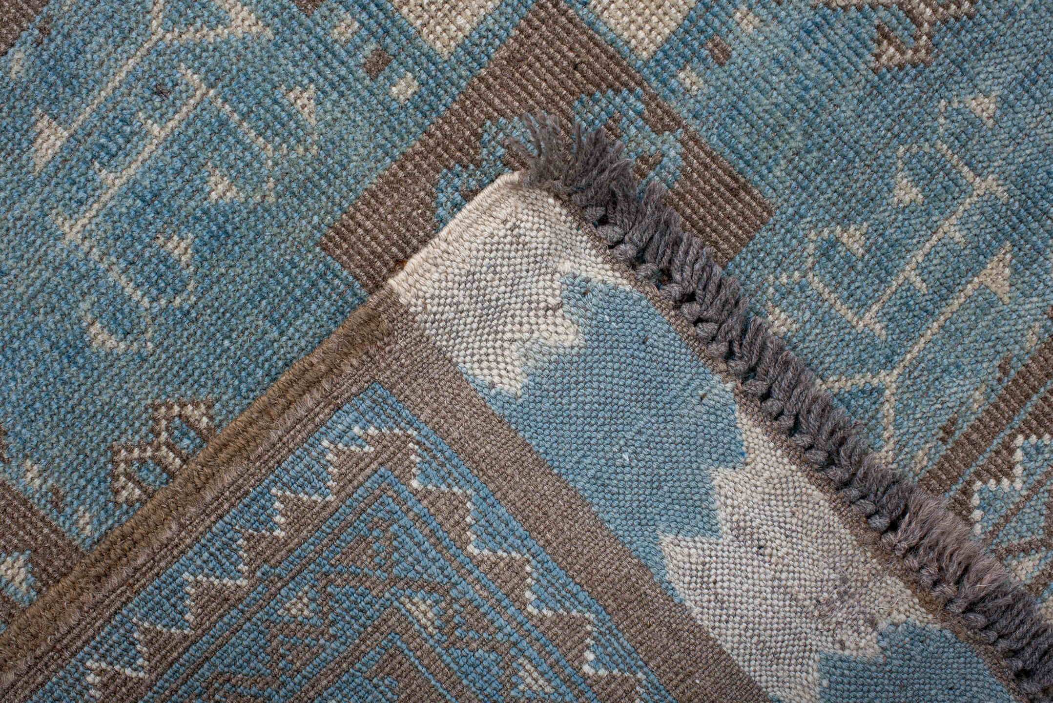 4' x 7' one-of-a-kind handmade vintage Afghan rug. Color palette: black, blue, brown, charcoal, dark gray, dim gray, gray