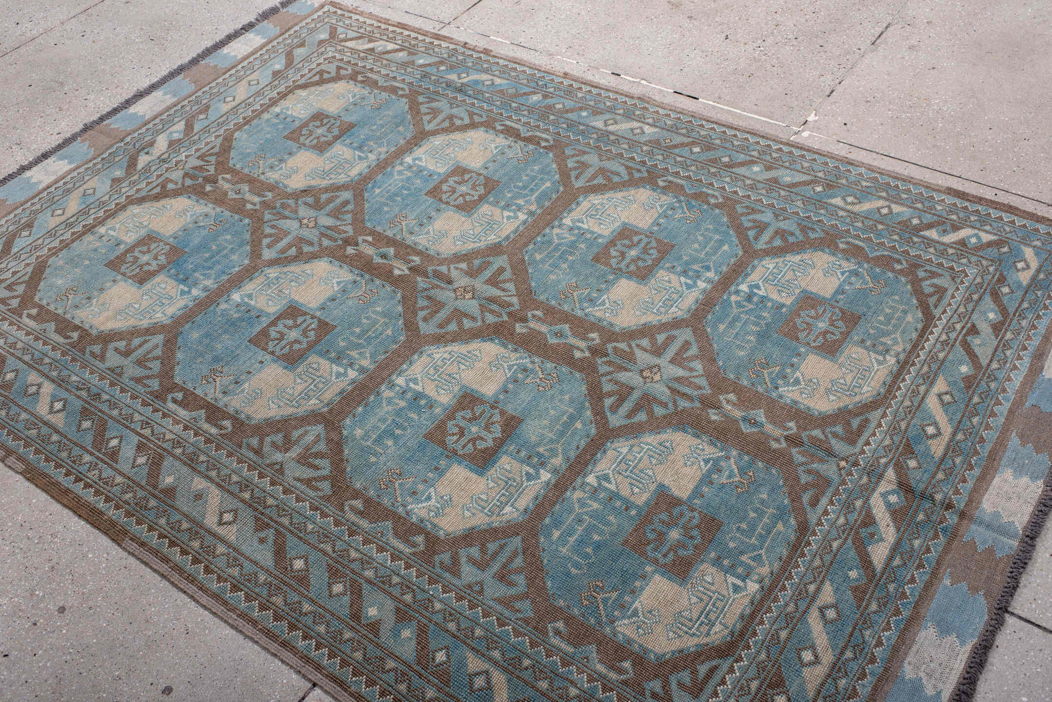 4' x 7' one-of-a-kind handmade vintage Afghan rug. Color palette: black, blue, brown, charcoal, dark gray, dim gray, gray