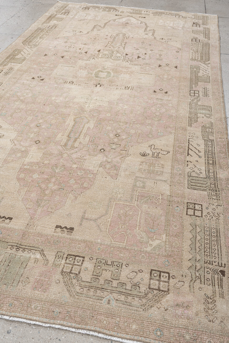 5' x 11' one-of-a-kind handmade vintage Malayer rug. Color palette: ivory, blush, taupe, camel, brown, pale blue, pink