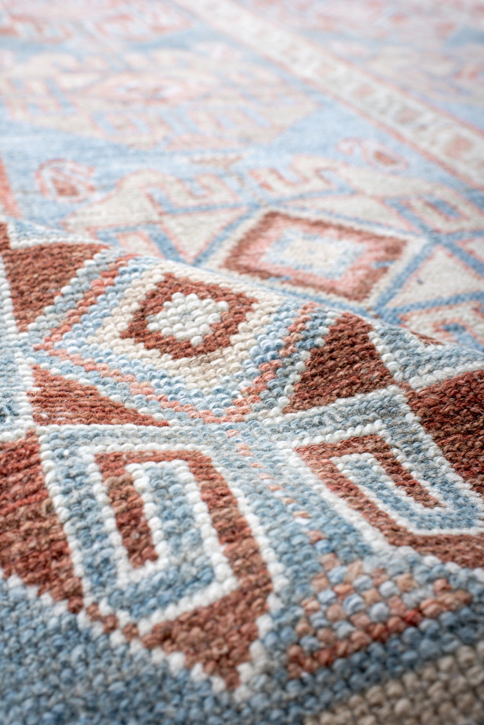 4' x 12' one-of-a-kind handmade antique NW Persian runner rug. Color palette: sky blue, ivory, terracotta, rust, camel