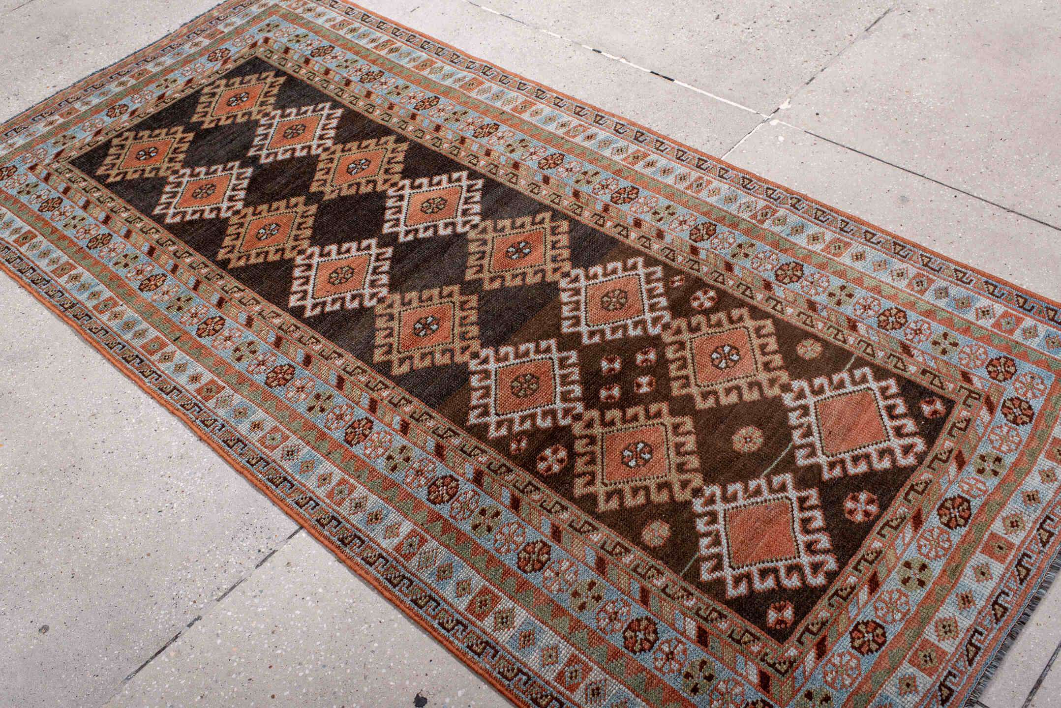 3' x 7' one-of-a-kind handmade vintage Gabbe runner rug. Color palette: black, blue, brown, dark gray, gray, light gray