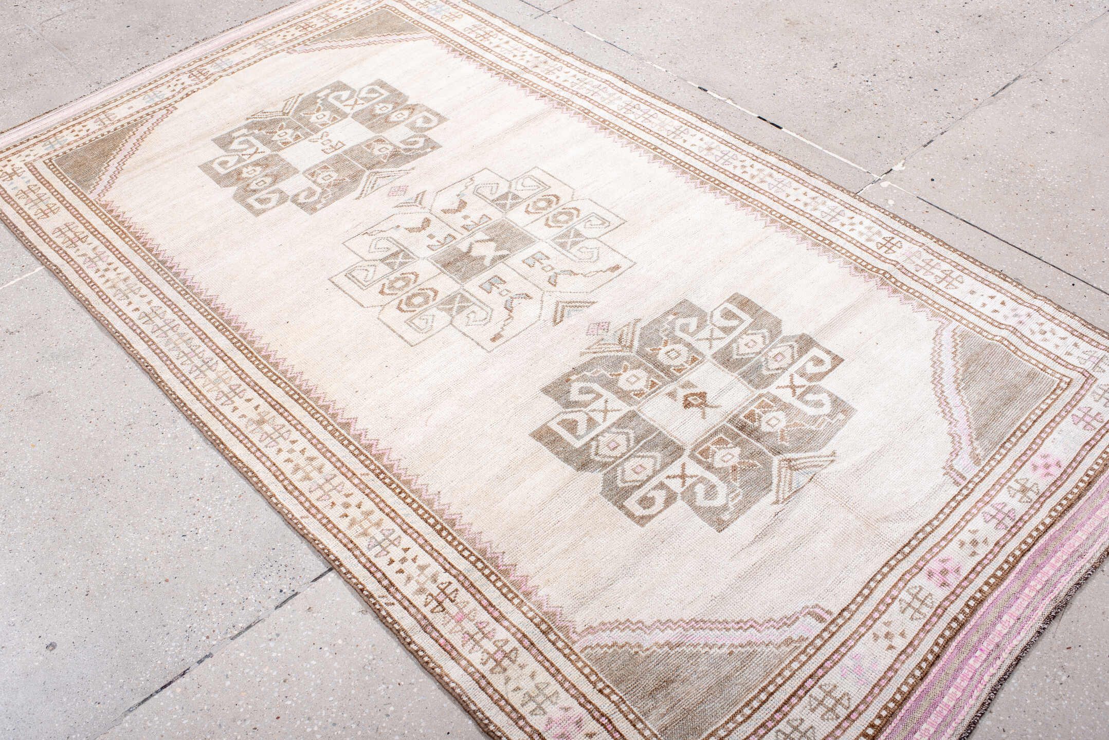 4' x 7' one-of-a-kind handmade antique Anatolian rug. Color palette: ivory, taupe, blush, camel, rose, brown, beige, gray