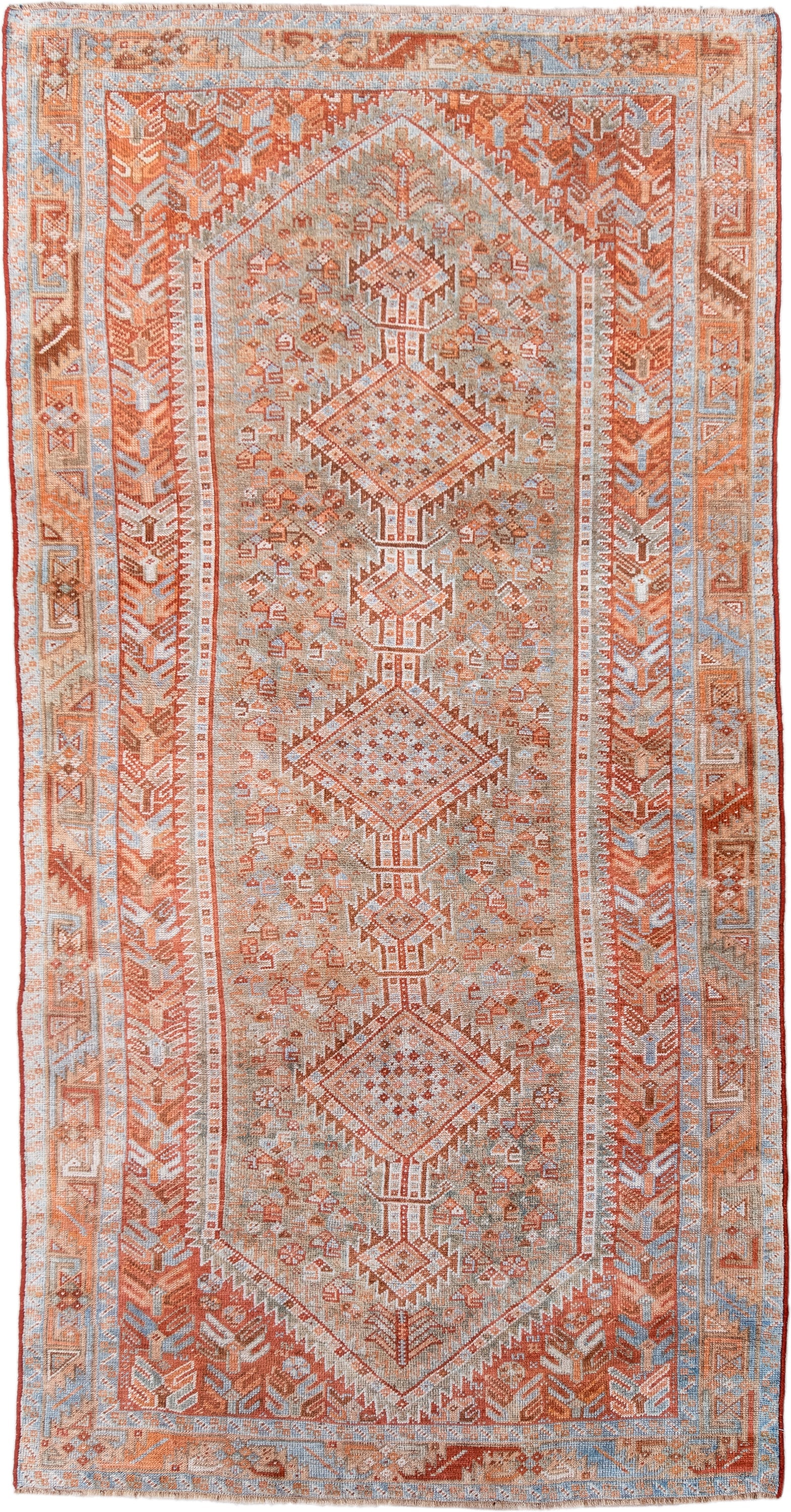 4' x 8' one-of-a-kind handmade antique Shiraz rug. Color palette: rust, ivory, pale blue, terra cotta, camel, taupe, brown