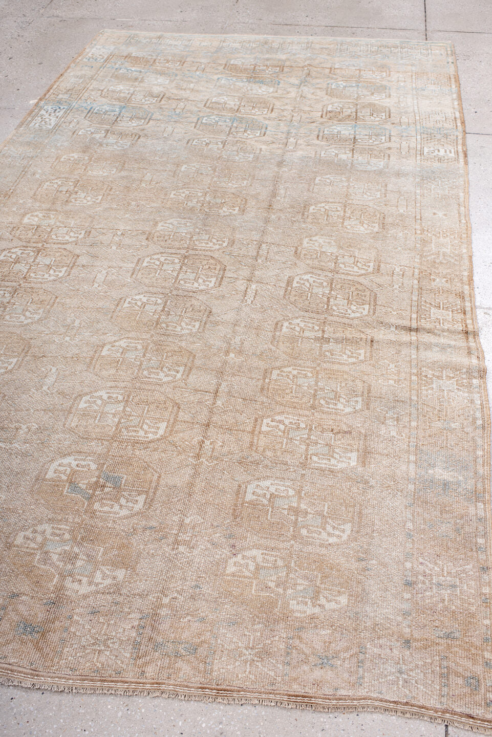 5' x 9' one-of-a-kind handmade antique Afghan medium size rug. Color palette: camel, ivory, taupe, light blue, beige, gray